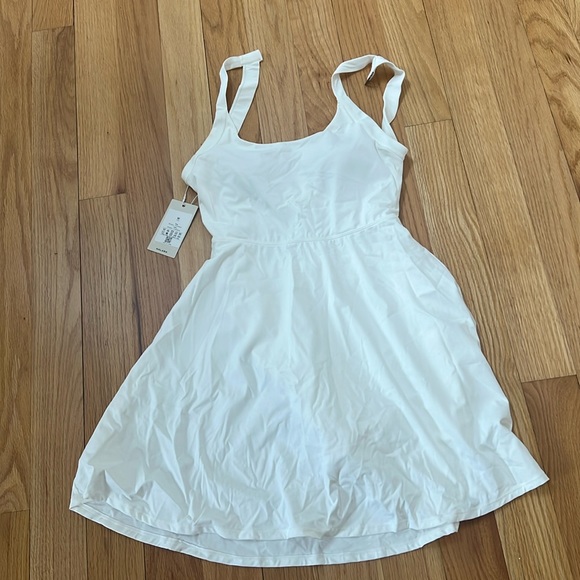 Backless twisted flare mini dance active dress. Longer length from Halara NWT - Picture 1 of 6